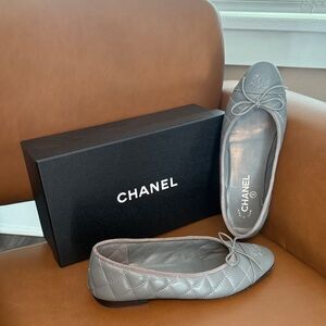 Similar to CHANEL Silver Quilted Leather Ballet Flats with Bow